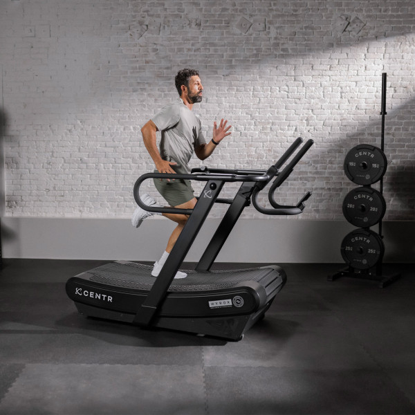 CENTR X HYROX Perform Curved Treadmill side running view